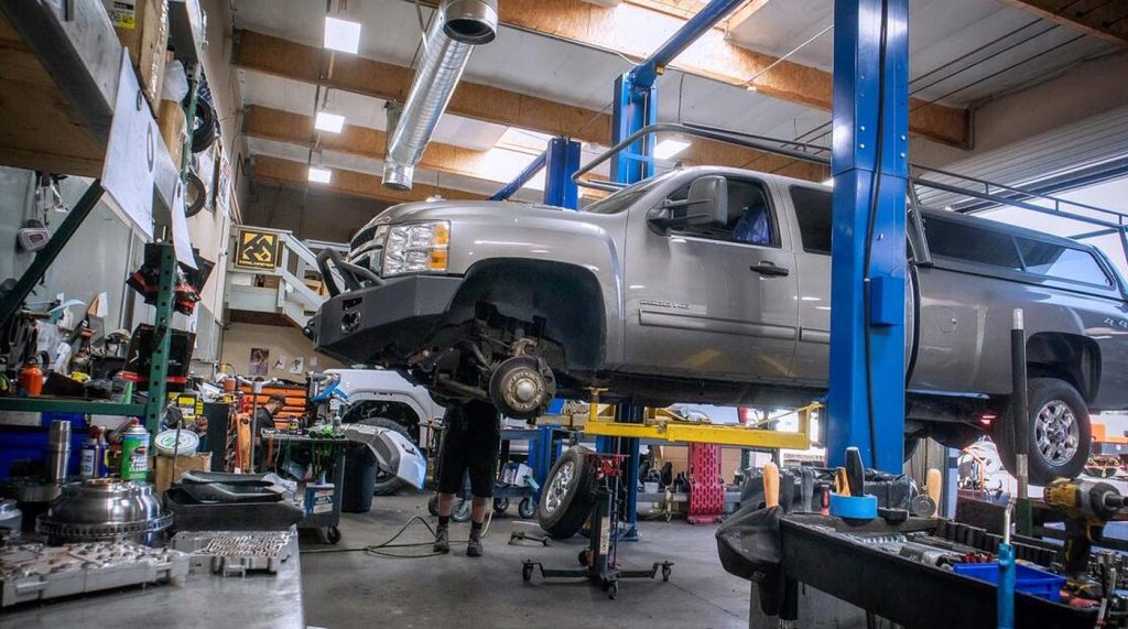 A truck on the lift at the Dmax Store