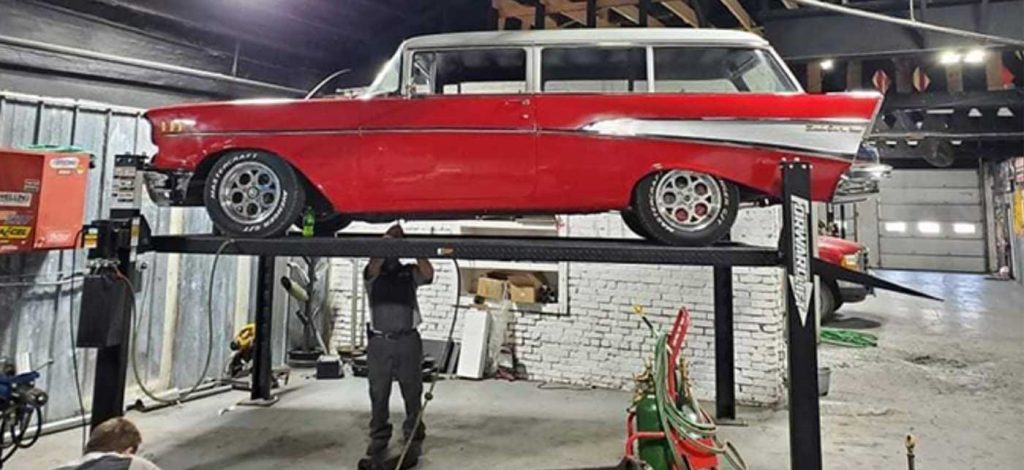 Bel Air Wagon on lift at Outlaw Garage