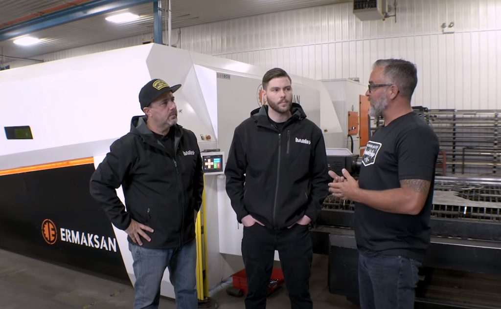 During the shop tour, Erik and Jay take a look at the largest laser cutter.