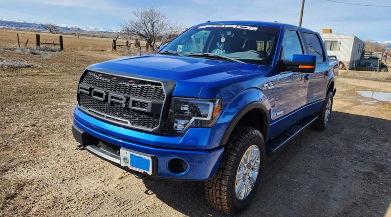 The exterior of the blue 2014 Ford F-150 FX4