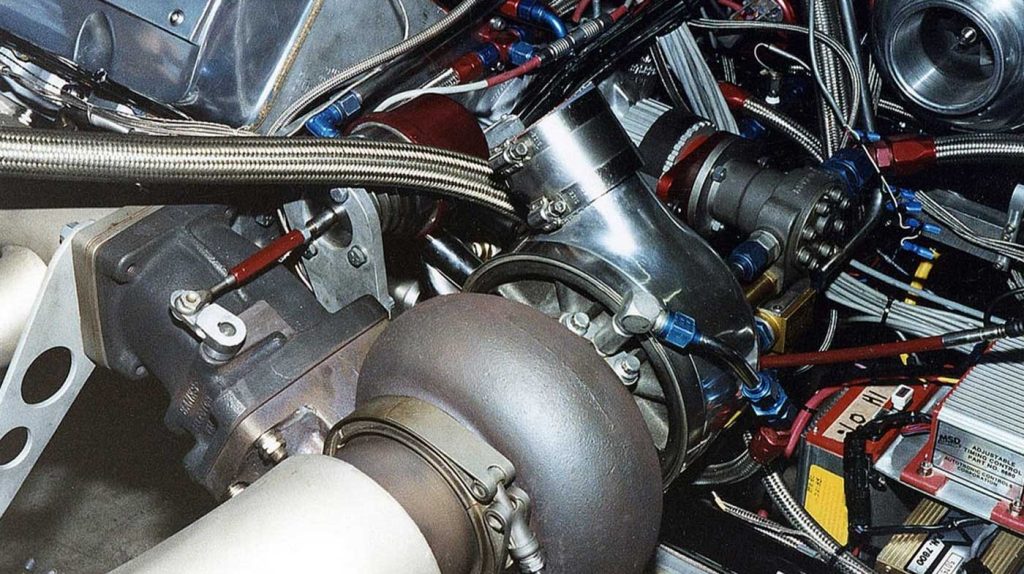 The engine compartment of the MADE IN THE USA top alcohol funny car