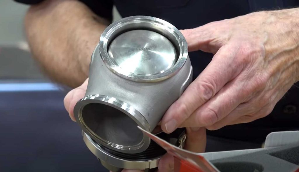 The Turbosmart wastegate in Gale's hands.