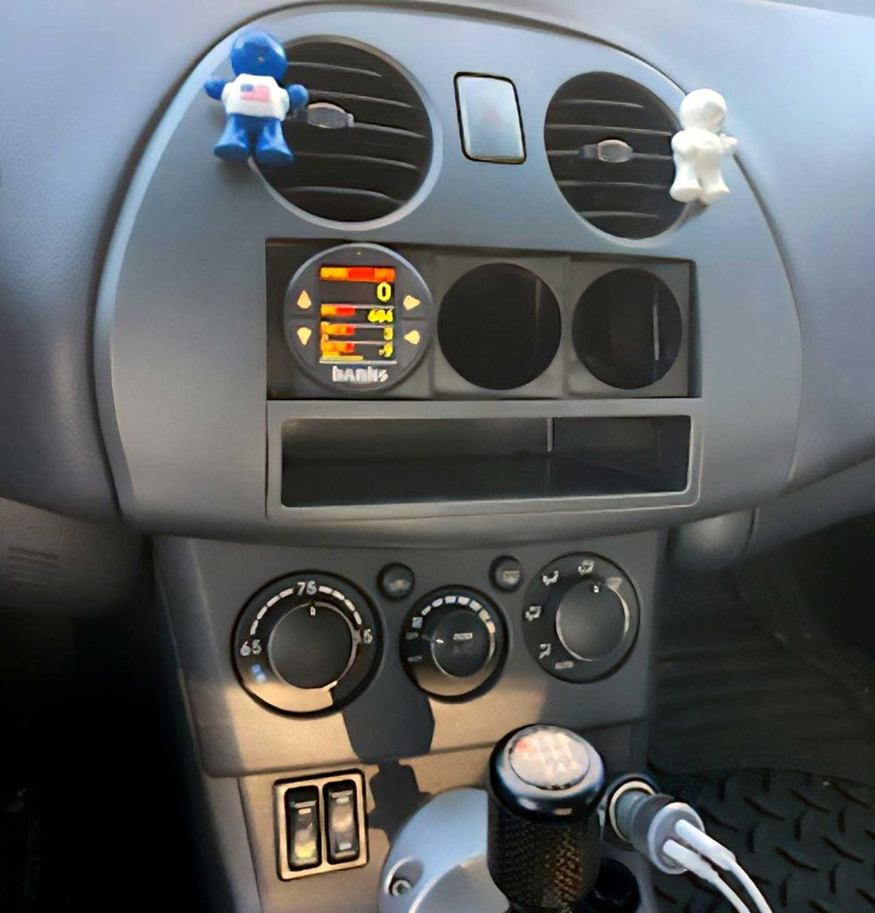 Interior of the Mitsubishi Eclipse showing the iDash installed