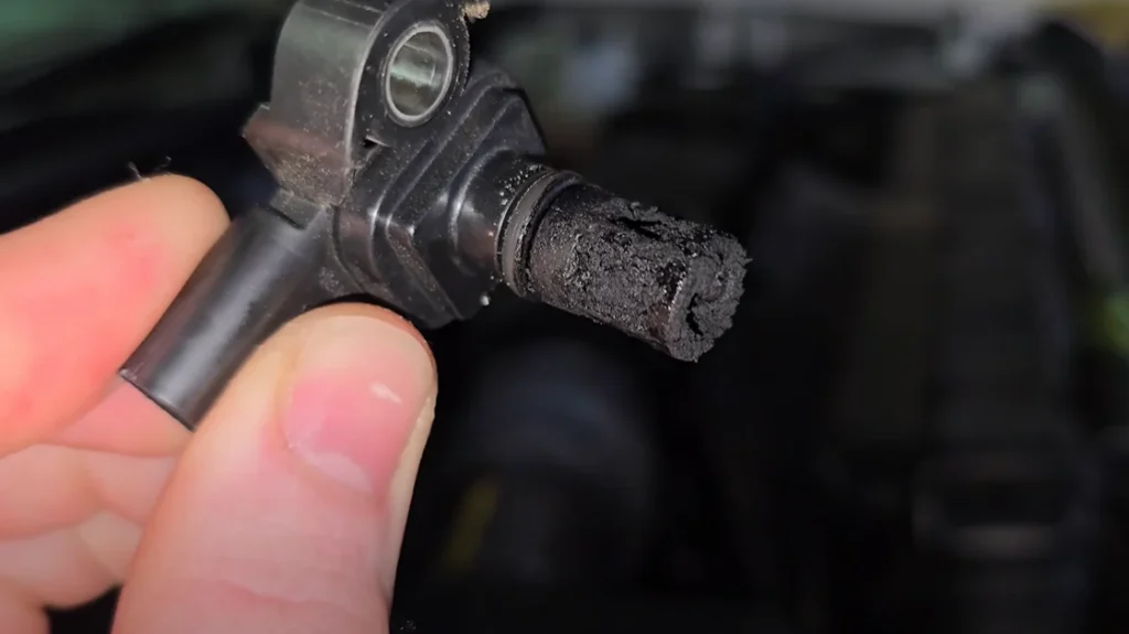 Close-up of soot-covered MAP sensor