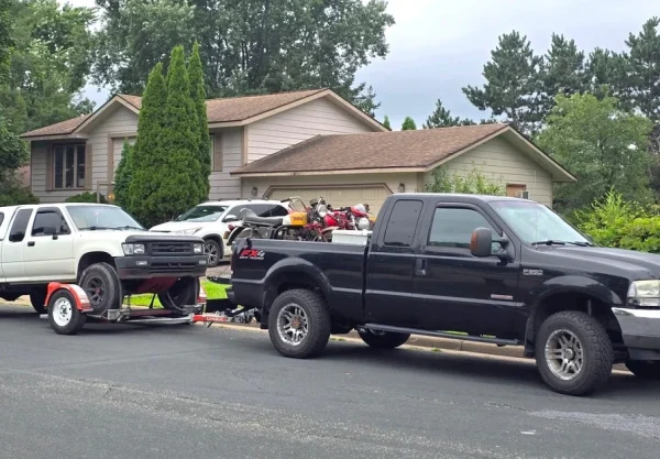 Ford F-350 towing trailer with Banks diff cover protection
