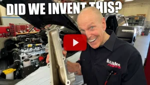 Gale Banks holding Cummins side draft intake manifold