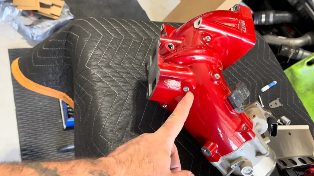 Monster‑Ram high‑flow intake plate installed in Cummins RAM