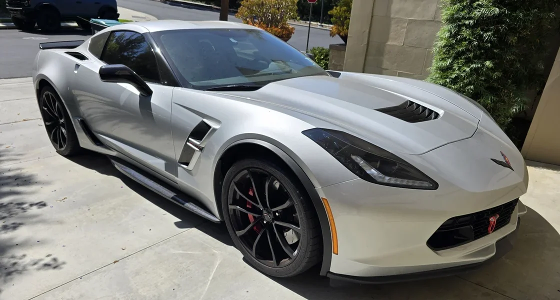 Corvette C7 interior showing Banks iDash Pro gauge with PedalMonster tuning